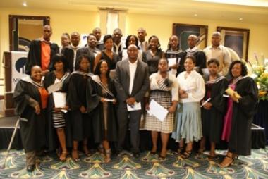 A group of Ithala learnership graduates receive their certificates from Milpark Business School