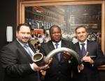 The Directors at Accelerate Property Fund, CEO Michael Georgiou (Left) seen with Tito Mboweni and Andrew Costa (COO) during the JSE listing event in 2013.
