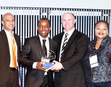 On behalf SA Commercial Prop News, Media Director Ortneil Kutama accepts the prestigious SAPOA Journalism Award for best Online News Coverage Category.