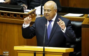 Public Enterprises Minister Pravin Gordhan said government would be willing to sell stakes in state firms to private investors 