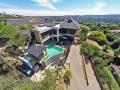 A four-storey designer mansion in the heart of Bedfordview belonging to Czech fugitive Radovan Krejcir was sold at an auction on Saturday morning.
