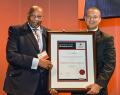Richard Maponya, a South African entrepreneur and property developer, received the award from Marius Muller, honored with a SACSC Pioneer Award and Chris Lawrence was acknowledged with a SACSC Lifetime Achievement Award. 