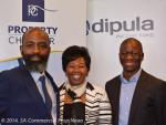 Property Sector Charter Council commit members, Musa Ngcobo, Portia Tau-Sekati, CEO of the Council and Mashilo Pipjeng share a moment during the anouncement of the research media brief held at the Davinci Hotel Johannesburg.