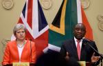 British Prime Minister Theresa May addressing a business leaders forum in with South Africa’s President Cyril Ramaphosa