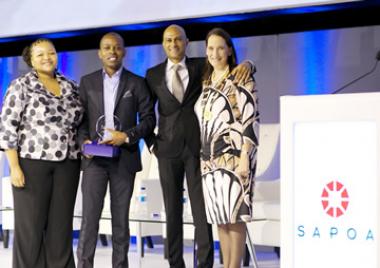 SA Commercial Prop News Media Director, Ortneil Kutama accepts the prestigious SAPOA Journalism Award for best Online News Coverage Category — 4th time in a row.