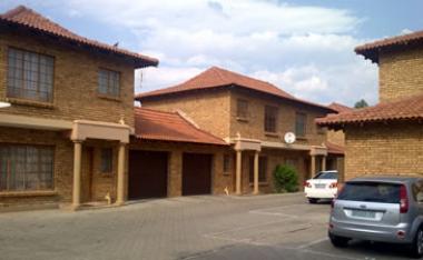 Two-bedroom apartments for sale in Die Bult, Potchefstroom, close to the North West University, for around R675 000 each. The apartments each have a garage and a parking bay, and monthly levy is currently R345 for this complex