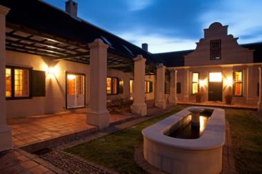 The Quoin Rock Wine Estate, valued by the liquidators at R120 million, was sold for R60,5 million to well known businesswoman, Wendy Appelbaum who also owns the De Morgenzon Wine Estate in Stellenbosch.