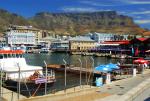 Cape Town’s working harbor, the V&A Waterfront with Table Mountain in the background.