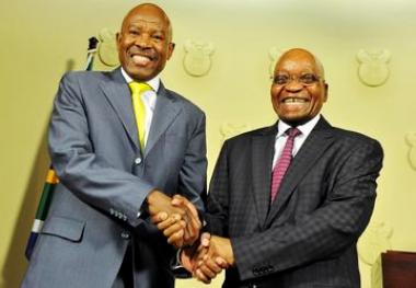 Lesetja Kganyago appointed new governor of South African Reserve Bank seen shaking hands with President Jacob Zuma after the announcement.